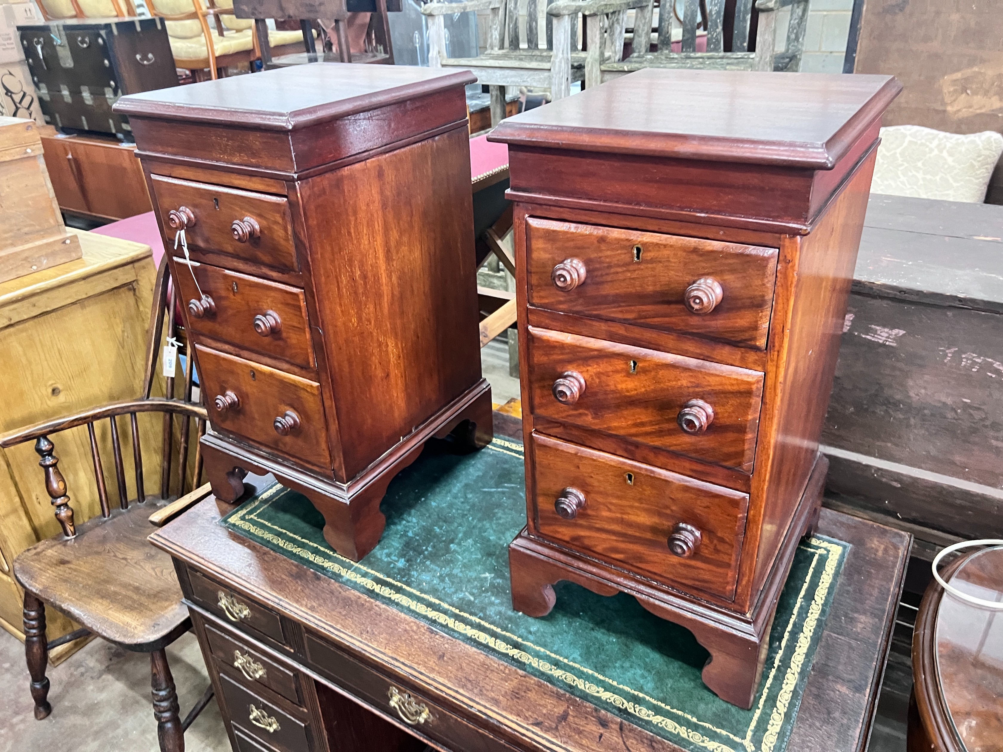 A pair of mahogany bedside chests (converted from desk pedestals), width 34cm, depth 39cm, height 67cm *Please note the sale commences at 9am.